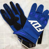 A pair of blue and black durable motorcycle off-road riding gloves are displayed on a white surface.