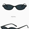 Black sunglasses with a retro oval frame shown from the front and side.