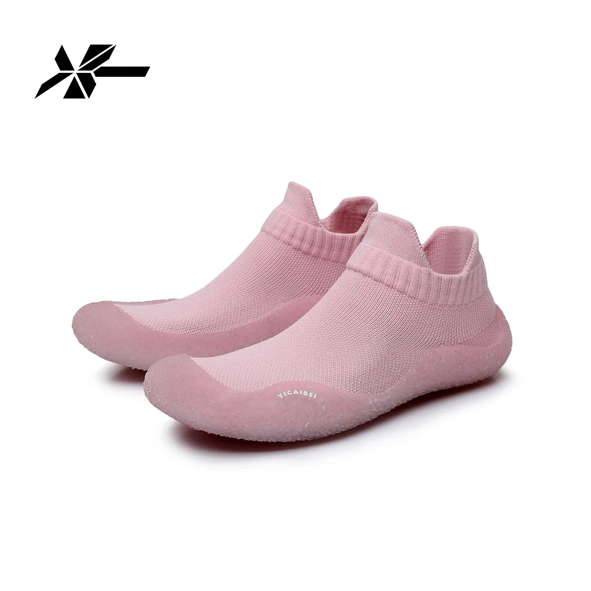 A pair of pink summer quick-dry slip-on shoes for beach and gym use.