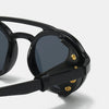 Black retro steampunk goggles sunglasses with gold accents shown in a close-up view.