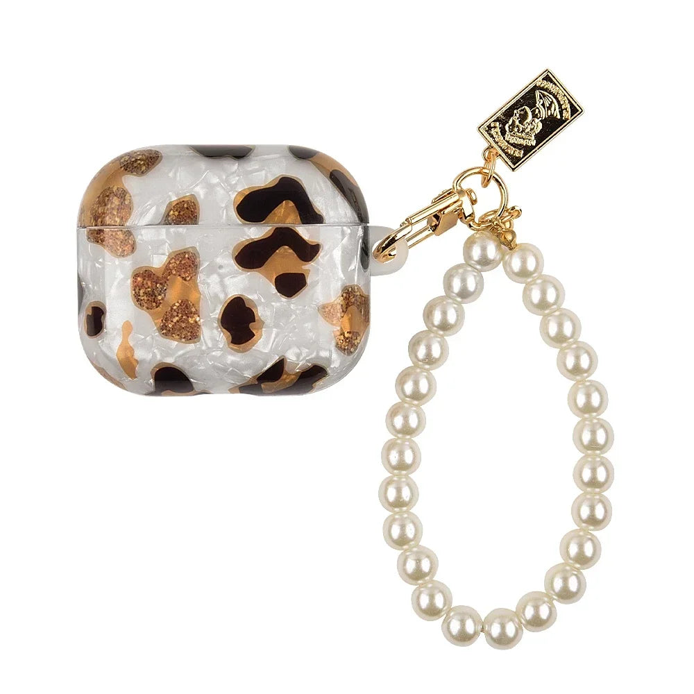 A leopard print protective case for AirPods Pro with a gold chain and pearl necklace.