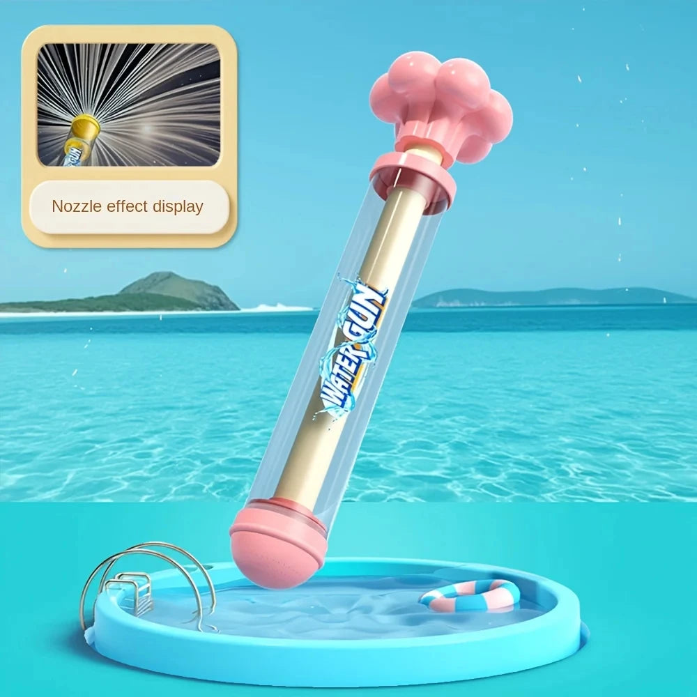 A pink water gun with a nozzle effect display is shown being used in a shallow pool.