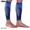 A pair of blue calf compression sleeves with black and blue mesh patterns shown on a person's legs.