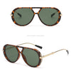 Hawksbill/green sunglasses with tortoiseshell frames and gold accents.