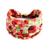 A stack of red and green floral patterned cotton stretch headbands.