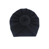 Dunkelblaue Baumwollbaby-Turban-Haube, gefaltet in runde Form.