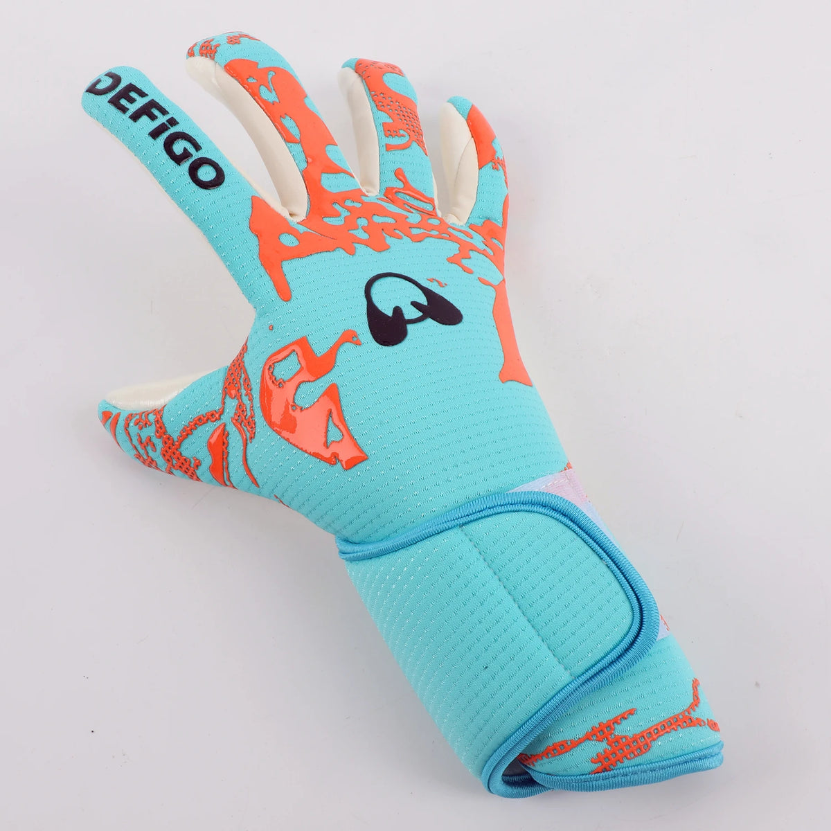 A bright blue goalkeeper glove with orange accents and the word DEFIGO visible on the back.