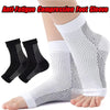 Manche de compression anti-fatigue blanc et noir sur une jambe.