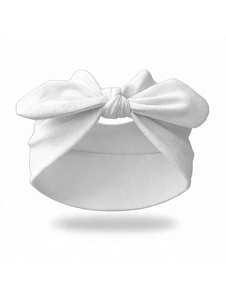 Un bandeau élastique blanc noué en nœud, vu de dessus.