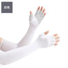 White cooling sun protection arm sleeves worn on a hand and forearm.