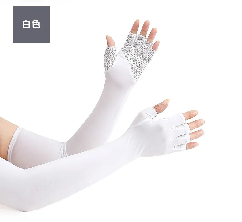 White cooling sun protection arm sleeves worn on a hand and forearm.