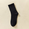 Chaussette noire pour homme en coton mélangé, montrée sur un fond clair.