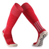 A pair of red football training socks for men shown flat, highlighting the design and cuff.