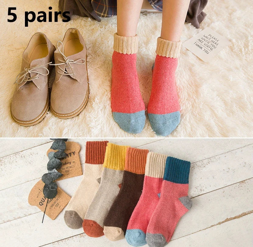 Five pairs of thermal knit crew socks in various colors including pink, orange, blue, and gray