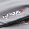 Gray fabric with red text reading SPORT MADE IN CHINA on it.