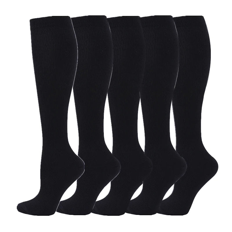 A pack of black medical grade compression socks for veins and sports.