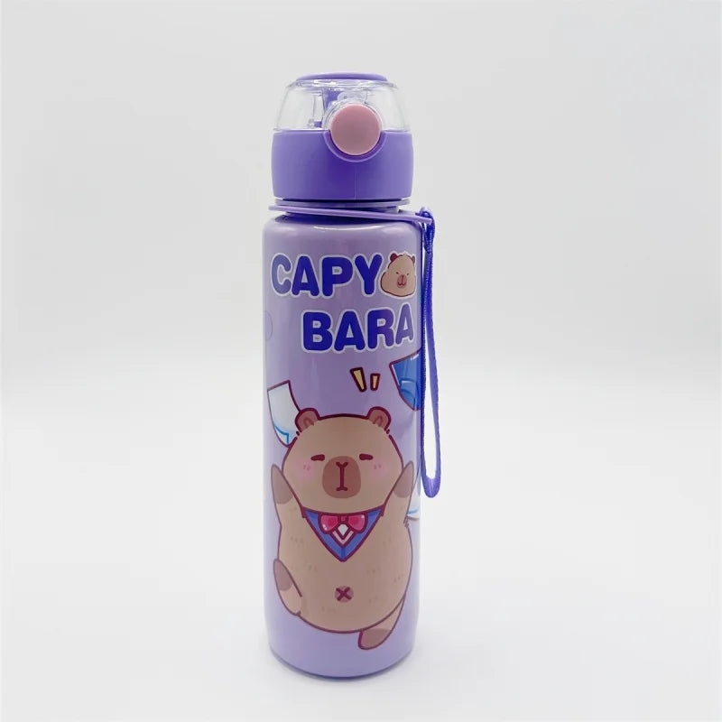 A purple insulated water bottle with a pink lid and a cute bear design on the body.