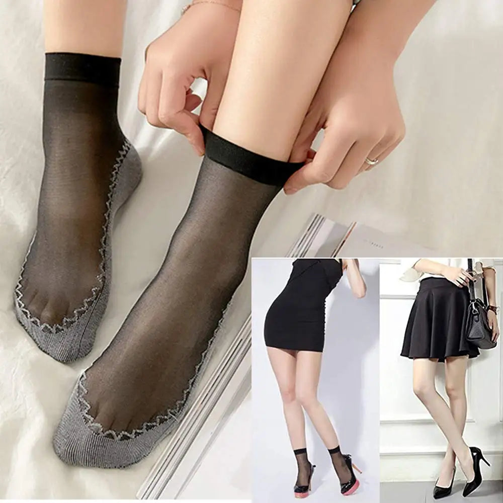 A woman is wearing sheer black breathable ankle socks with a black cuff and lace trim.