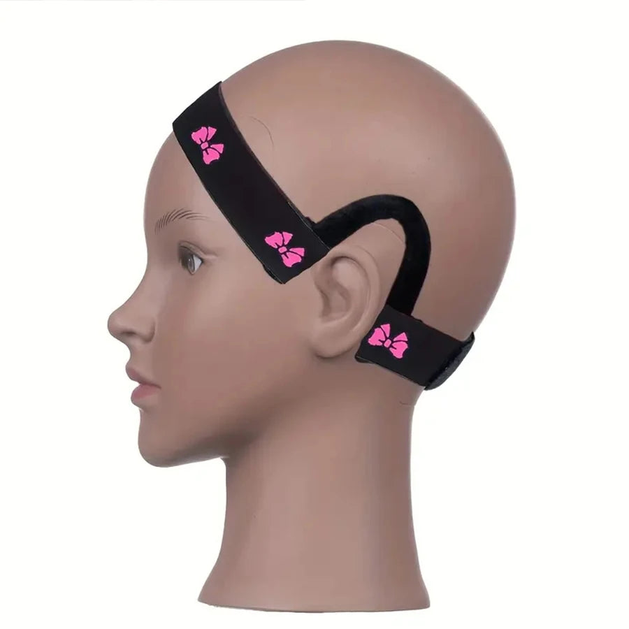 A mannequin head displays an adjustable lace wig band for hair edges in black with pink bows.