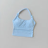 Light blue seamless yoga and pilates sports bra shown flat lay