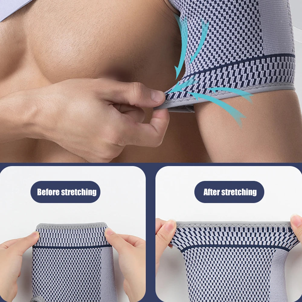A hand is stretching a gray and blue mesh shoulder support brace on a person's shoulder.