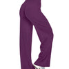 A model is wearing purple high-waist yoga pants and white athletic shoes.