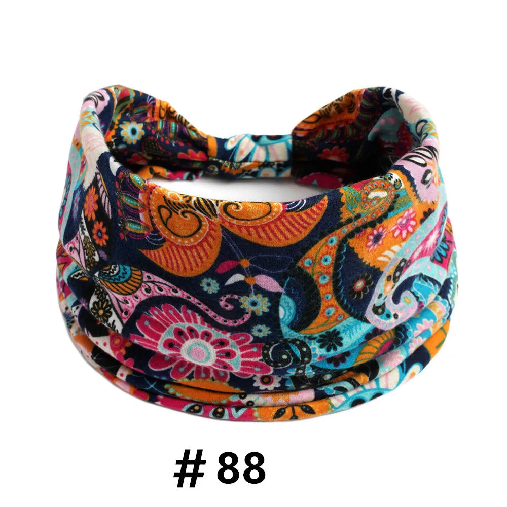 Boho print cotton headband featuring vibrant floral and paisley patterns in orange, pink, blue, and black.