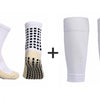 A set of white soccer socks and knee guards, including a ankle sock, a calf sock, and two long sleeves.