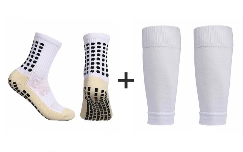 A set of white soccer socks and knee guards, including a ankle sock, a calf sock, and two long sleeves.