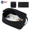 Black waterproof sports shoe carrier bag with multiple compartments and a carrying strap.