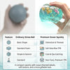A hand holds a clear blue ocean squishy toy with iridescent details and sea life elements.