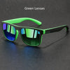 Green lenses vintage designer square sunglasses resting on a dark surface.