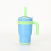 A light blue stainless steel travel mug with a lime green lid and handle.