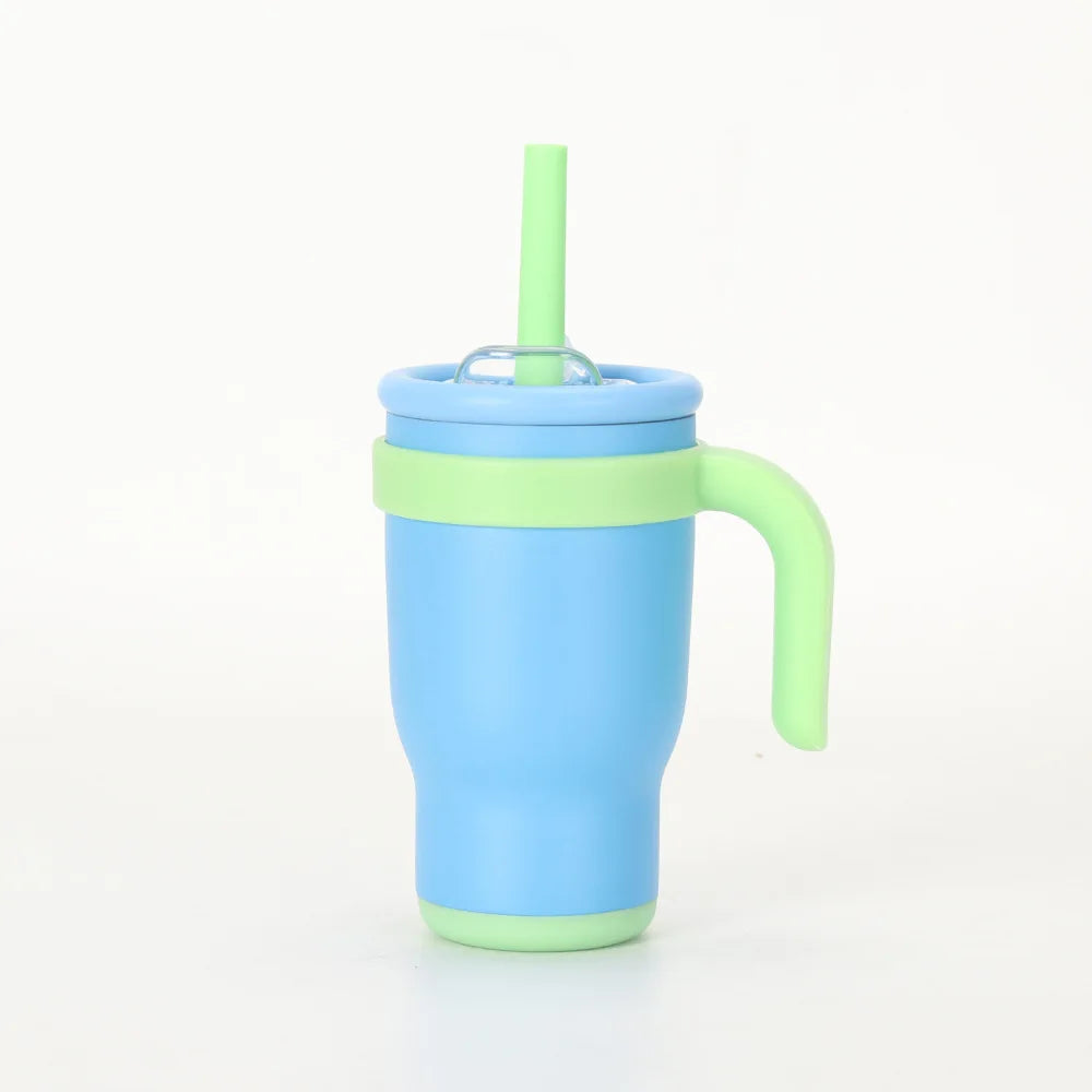 A light blue stainless steel travel mug with a lime green lid and handle.