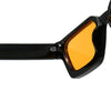 A close-up view of black retro square frame sunglasses with orange tinted lenses.
