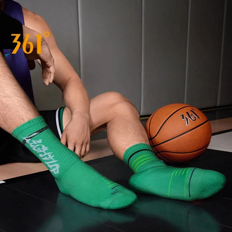 A person wearing bright green performance basketball running socks is shown in a 360-degree view.