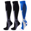 A set of three compression socks in black, gray, and blue for athletes and medical use
