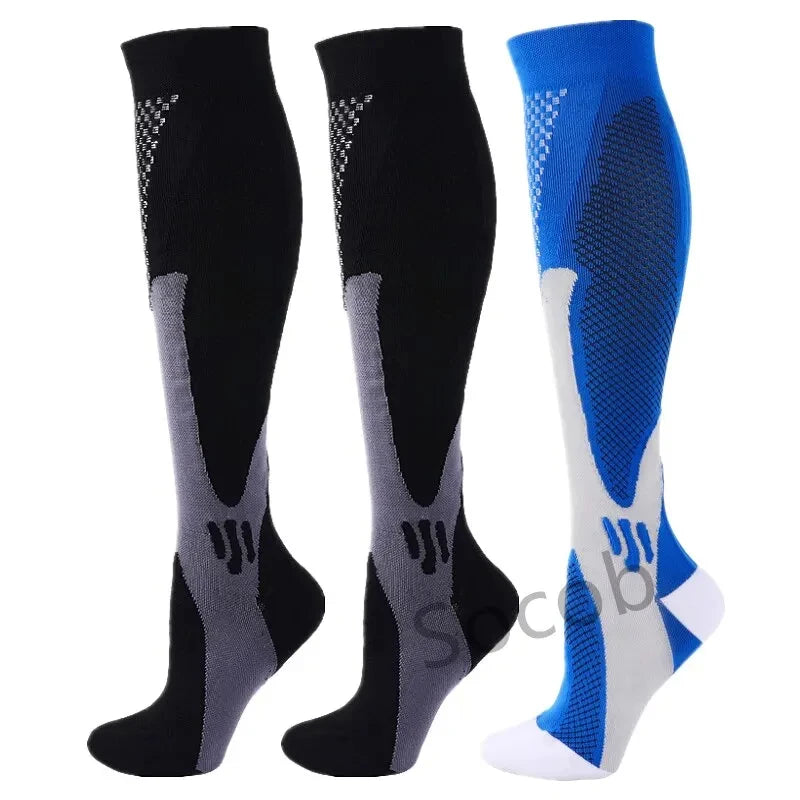 A set of three compression socks in black, gray, and blue for athletes and medical use