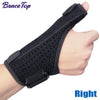 A black BraceTop wrist and thumb support brace worn on a hand.