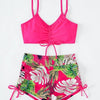 A bright pink floral print two-piece high-waist bikini set featuring tropical leaves.