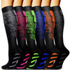 A row of black compression socks in various bright colors, including pink, green, blue, orange, and yellow.