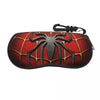 A black and red spider web patterned pouch with a strap, designed for eyeglasses.