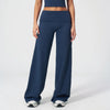 A model wearing navy blue flared high-waist yoga pants and a matching crop top.