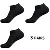 Tres pares de calcetines deportivos negros de algodón para hombre y mujer