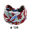 Bandeau en coton élastique à motifs floraux marron et bleu style bohème.