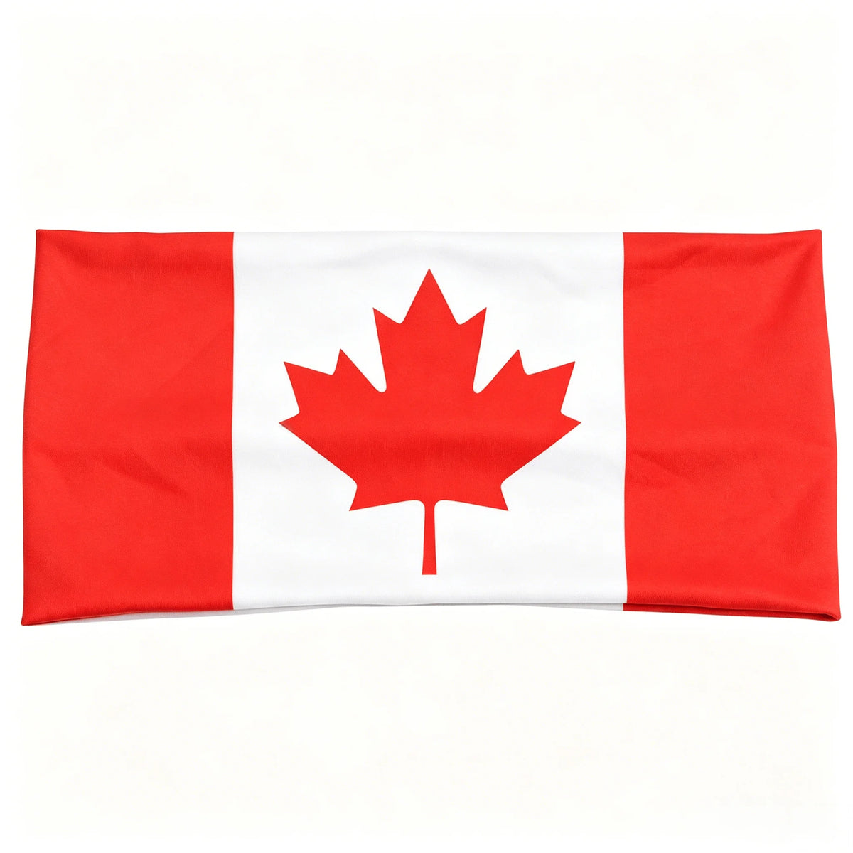 Drapeau rouge et blanc plié avec un motif de feuille d'érable rouge.