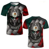 A dark green and red graphic t-shirt featuring a stylized Aztec or indigenous face mask design with a crown and the word MEXI