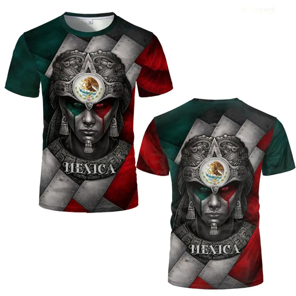 A dark green and red graphic t-shirt featuring a stylized Aztec or indigenous face mask design with a crown and the word MEXI