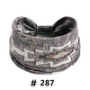 A gray and white patterned boho cotton turban headband for workout or yoga.