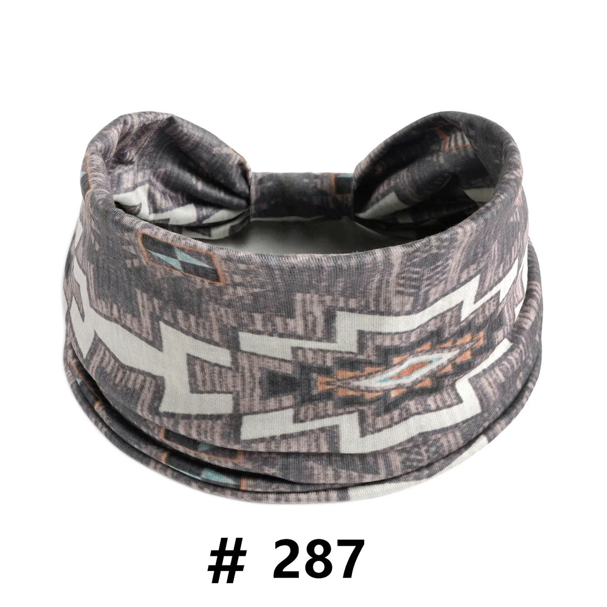 A gray and white patterned boho cotton turban headband for workout or yoga.